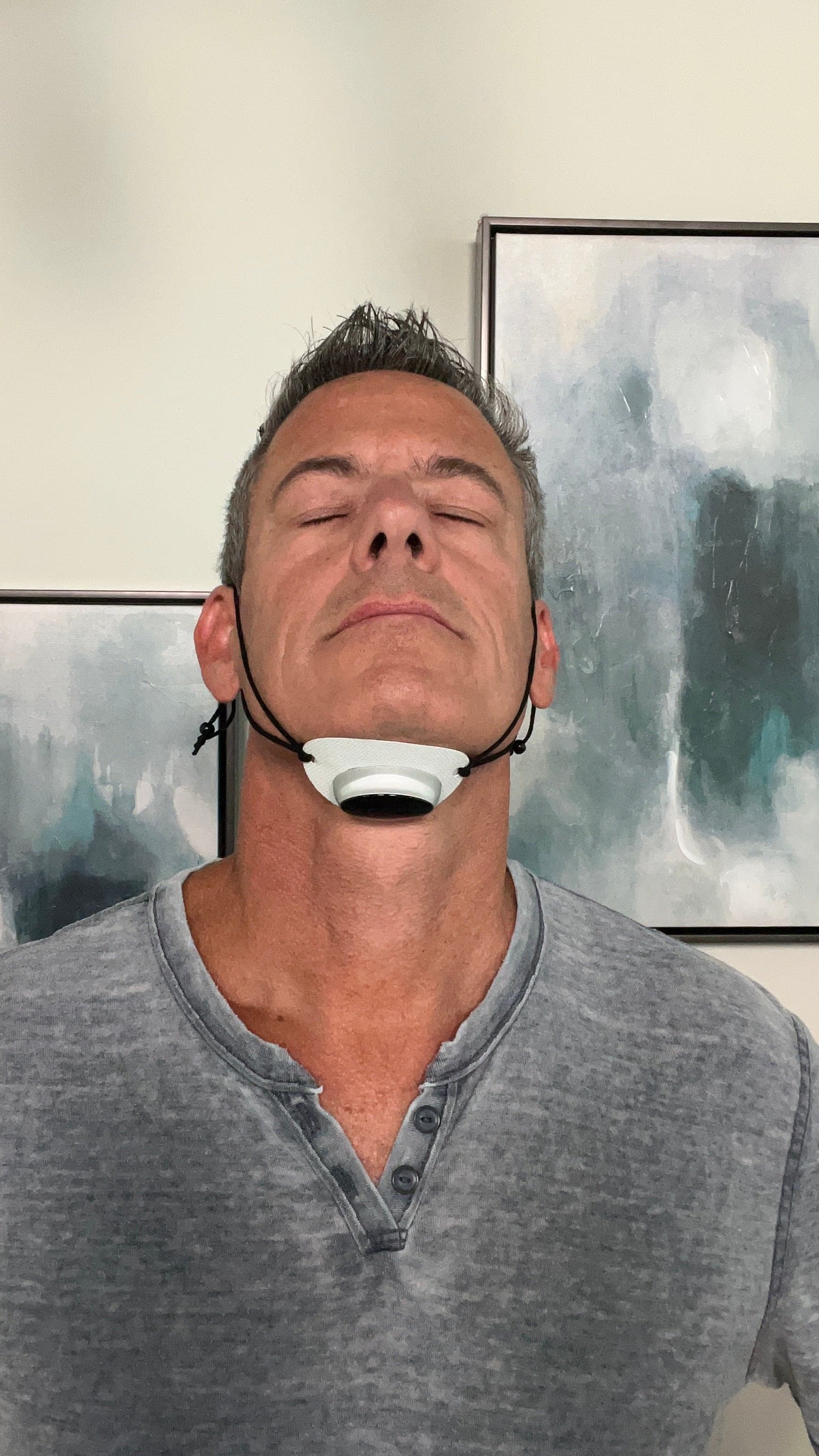 Wearing the SleepEase Pro device under the chin